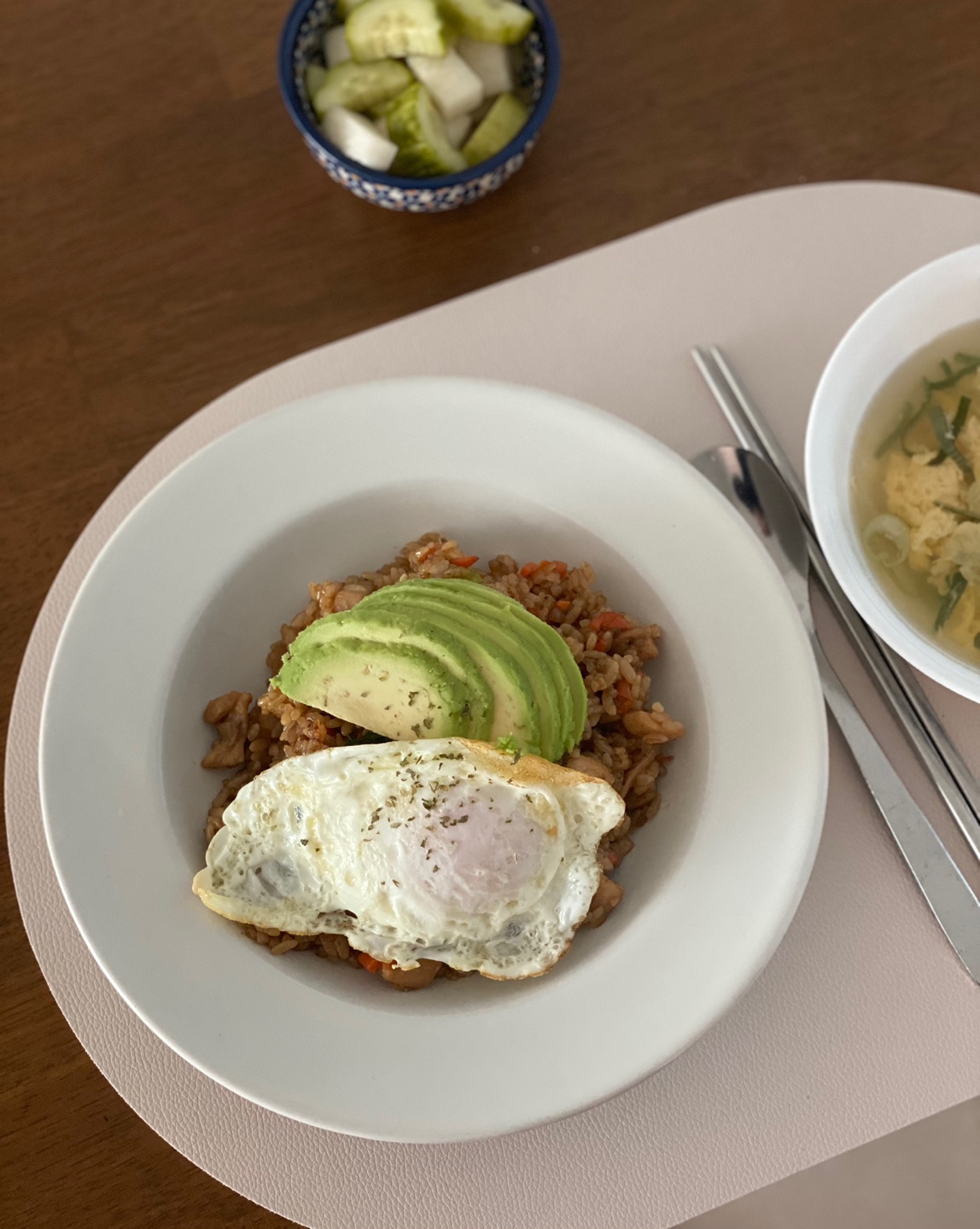 Nasi goreng with fried egg and avocado